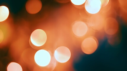 Fototapeta premium Warm golden bokeh creates a serene abstract background perfect for creative digital design projects