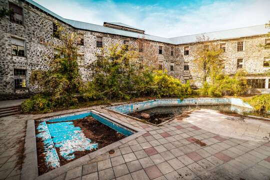 Abandoned dirty pools and old ruined hotel