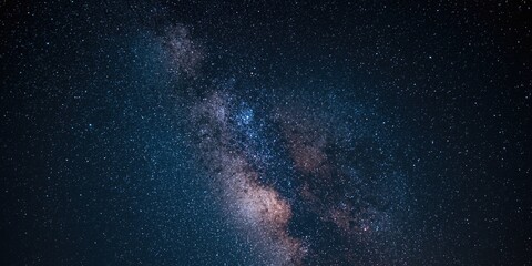Obraz premium enhanced long exposure shot of milky way galaxy with added grit star dust effect