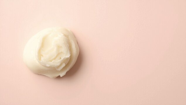 Fresh curd portion on light pastel background showing copy space