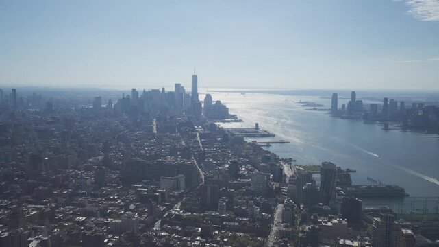 Panoramic aerial drone footage of New York City skyline and Hudson River on a clear day.