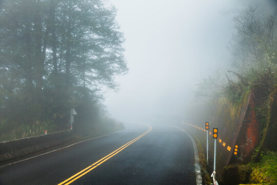 Low Visibility Fog on Mountain Road