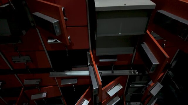 Exploring the dark storage space filled with open drawers at an unknown location late at night