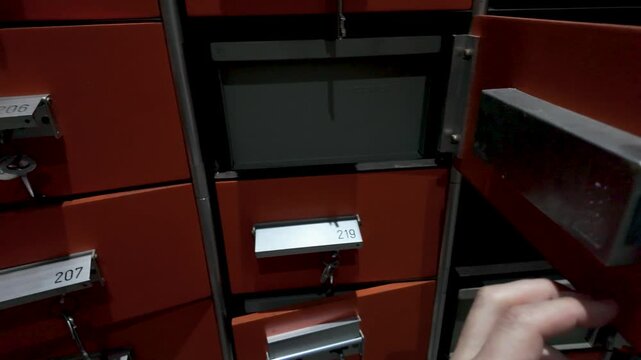 Exploring a package locker system to retrieve a delivery in a busy urban area at night