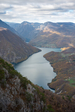 Artificial lake Perucac surrounded with mountains during cloudy day, view point Banjska stena on Tara mountain