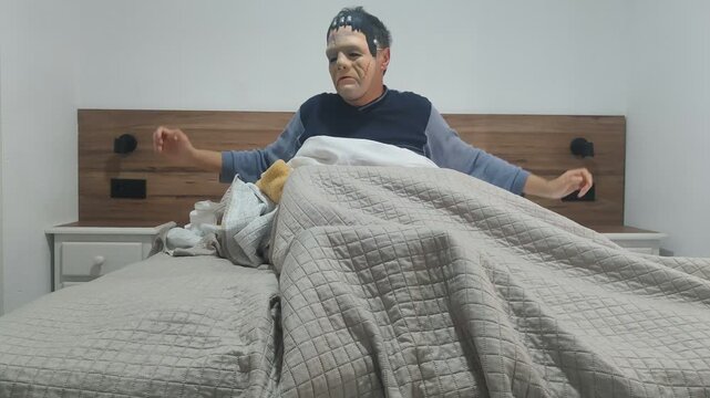 Frankenstein's monster waking up and yawning in bed