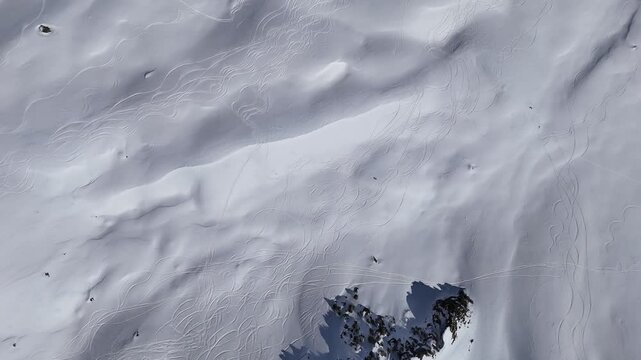 Aerial ski slopes of ski slopes in the mountains by winter
