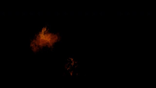 A small fire ignites and burns brightly against a solid black background.