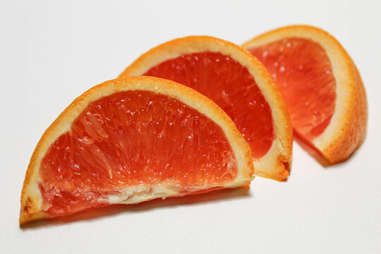 Cara cara navel orange, cuts of oranges, isolated on white background