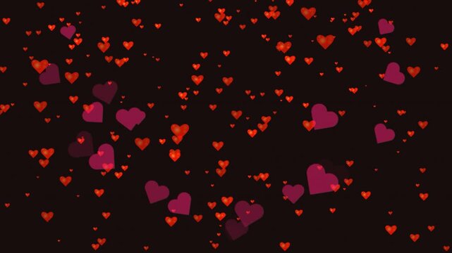 Floating red heart shapes moving across the screen in a romantic motion sequence for love themed video background projects