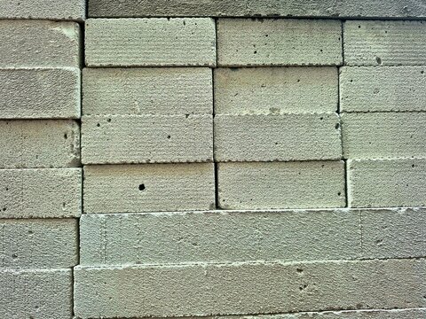 Stacked lightweight concrete blocks background texture
