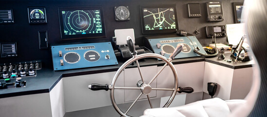 Digital dashboard with navigation monitor system, radar and VHF Radio in ship captain bridge or boat engine control room. Wheelhouse steering console on maritime transport. Nautical vessel technology © zephyr_p