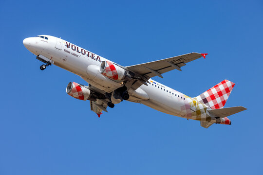 Luqa, Malta - May 29, 2026: Volotea Airbus A320-216 (REG: EC-NTL) climbing out of runway 13.