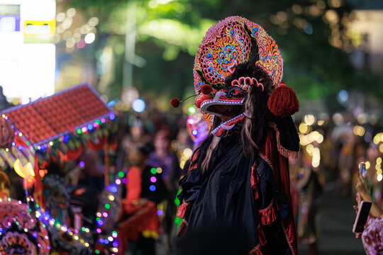 Surabaya, Java Timur, Indonesia - May 16, 2026 - A performer in animal costume at the Surabaya Vaganza 2026 nighttime parade in Surabaya
