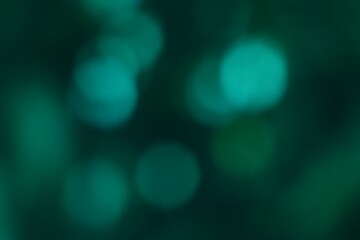 Abstract green bokeh background with blurred glowing © M Halim Abduh