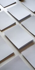Obraz premium Blank White Paper Sheets Stacked on Desk, Office Document Mockup Background. High-quality realistic photograph featuring multiple stacks of blank white paper sheets arranged on a clean desk. 