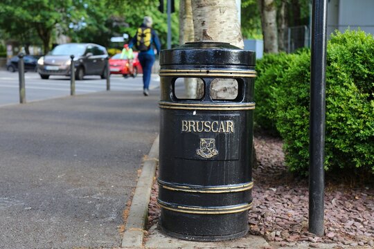 Public litter bin in a street in downtown Killarney, Ireland. Bruscar means litter in Irish language.