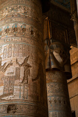 Ancient Egypt temple stone columns hieroglyphics painted ceiling vertical interior.  © Yar