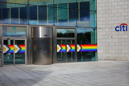DUBLIN, IRELAND - JULY 7, 2024: Citigroup office building celebrating Pride Month (June) with LGBTQ flags in Dublin, Ireland.