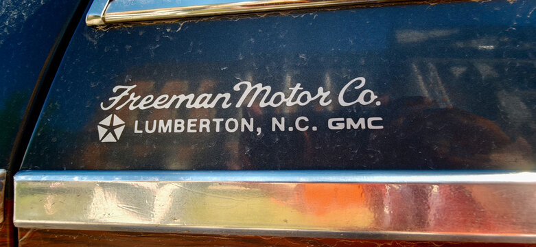 Saint Petersburg, Russia - May 23, 2026: Freeman Motor Company logo on a vintage Pontiac Parisienne Marauder vehicle in Lumberton, North Carolina, showcasing classic automotive branding
