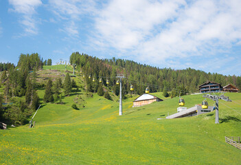 Piz Sorega cable car with circulating gondolas. spring landscape St. Kassian, dolomites alps © SusaZoom