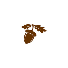 A solid, brown silhouette of an acorn attached to two oak leaves. © Pernah