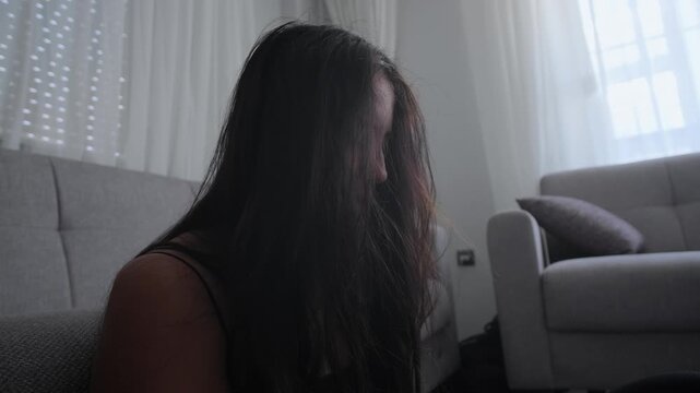 Close up emotional aftermath with depressed woman crying after toxic digital relationship conflict, emotional overload, mental stress and psychological vulnerability