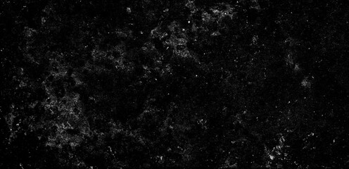 Obraz premium Dark abstract background with fine dust and scratches, distressed film grain texture, grunge overlay for creative projects, vintage aged surface effect.
