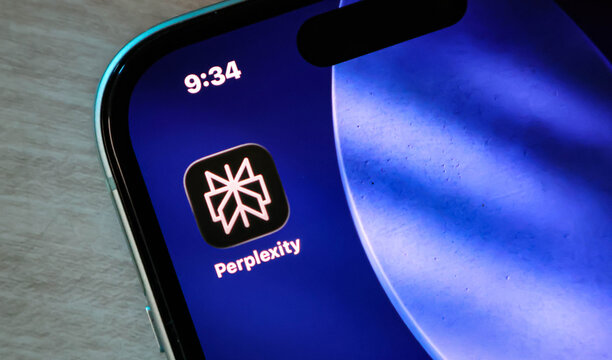 Closeup of the perplexity ai app icon on a smartphone screen, showcasing modern mobile technology and artificial intelligence software interface