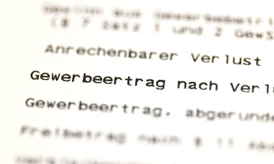 Fototapeta premium Close-up of a German trade tax form(Gewerbesteuer), document for determining trade income. Tax office, application, trade tax return for companies.