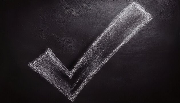 chalk drawing of a large check mark on a dark surface