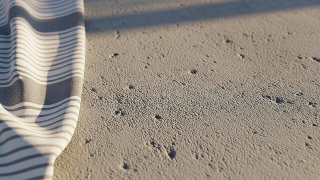 Textured Concrete Surface with Folded Striped Fabric