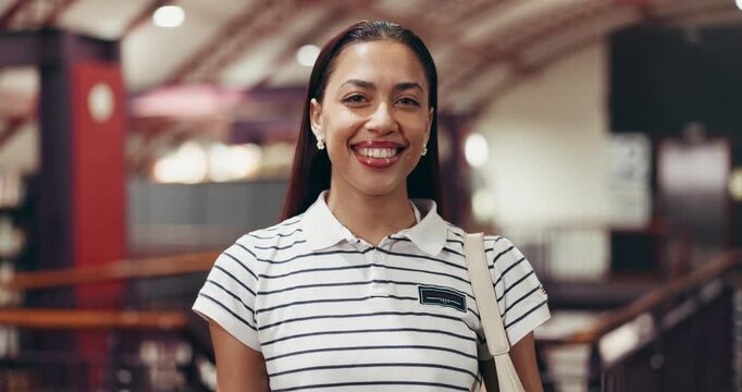 Face, student and woman in library, university and education with scholarship, learning and college. Happiness, academic and person with confidence, knowledge and growth with books, studying or pride