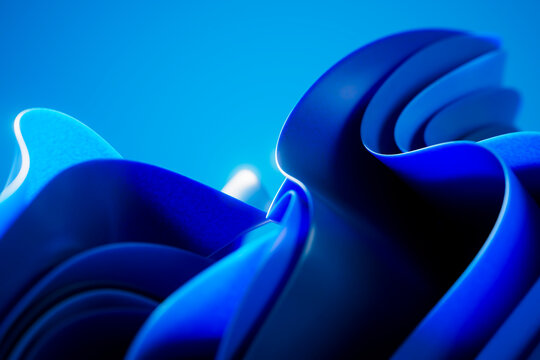 3D folded blue cloth with layered sculptural waves