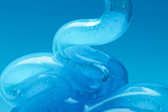 3D clear gel curve with suspended bubbles in blue liquid