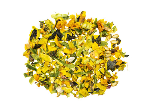 Top view of mixed dried vegetable flakes and seeds, colorful yellow green blend isolated On Transparent Background, food ingredient texture.