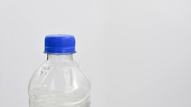 Recyclable plastic bottle, symbol of sustainability and care for the environment. Recyclable plastic bottle detail, an ecological choice to reduce environmental impact.