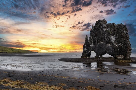 Basalt rock Hvitserkur, Elephant Rock on lava beach, dramatic evening sky, Vatnsnes Peninsula, H&uacute;nafj&ouml;r&eth;ur, North Iceland, Iceland