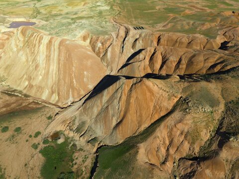 View from above of hilly rock formations and extensive earth-coloured areas with sparse vegetation, aerial view, mountains on D70 and D80, Tuzluca, Igdir province, Iğdır, Eastern Anatolia, Anatolia, Turkey