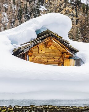Snow-covered dormer window, mountain village of Zinal, Val d'Anniviers, Valais Alps, Canton Valais, Switzerland