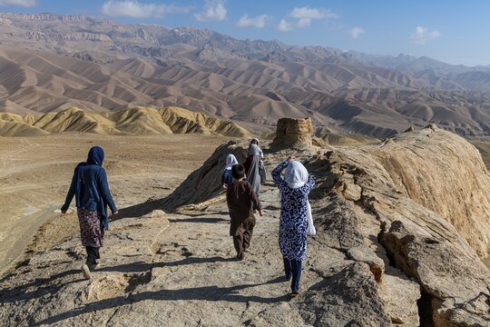 Women exploring Darya-e Adjahar (Dragon Valley), Bamyan, Afghanistan