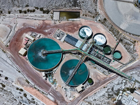 Aerial view of thickeners and tanks at a mining water treatment plant