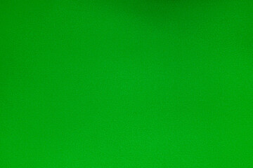 Fototapeta premium Solid green textured surface background for chroma key editing design