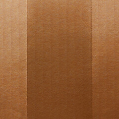 Fototapeta premium Close-up of textured brown cardboard with vertical lines and shading.