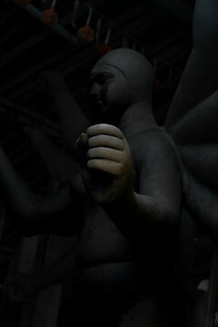 Focus on god idols hands that shape faith