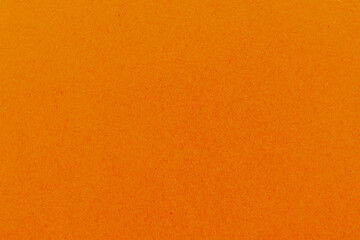 Vibrant orange textured background with copy space