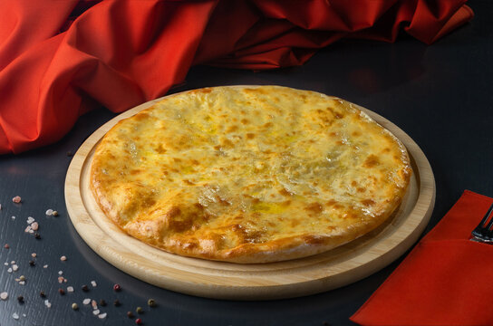Traditional georgian pastry - megrelian khachapuri with cheese.