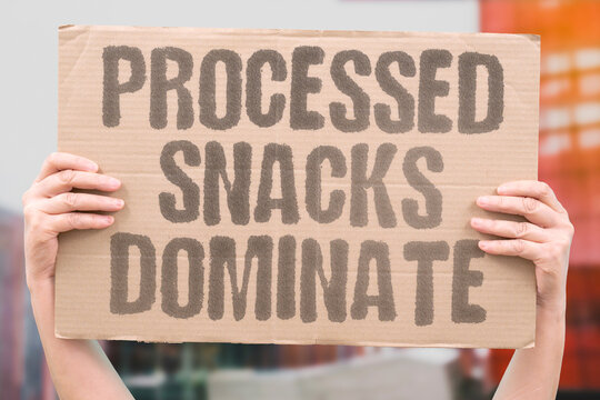 "Processed Snacks Dominate" Packaged options crowd out real food choices. PROCESSED. SNACKS. FOOD. NUTRITION. MARKET.