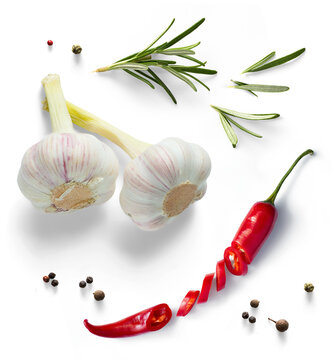 garlic bulbs, chili pepper and green organic rosemary leaves isolated on white background. Transparent background and real natural transparent shadow; Ingredient, spice for cooking. collection for cul