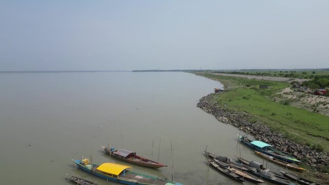 Wide drone view of Jamuna River and surrounding landscape Bangladesh 4K